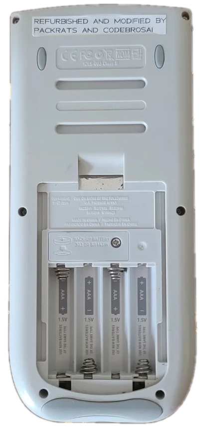 Back of the AI-84 with a label reading Refurbished and modified by Packrats and CodeBrosAI
